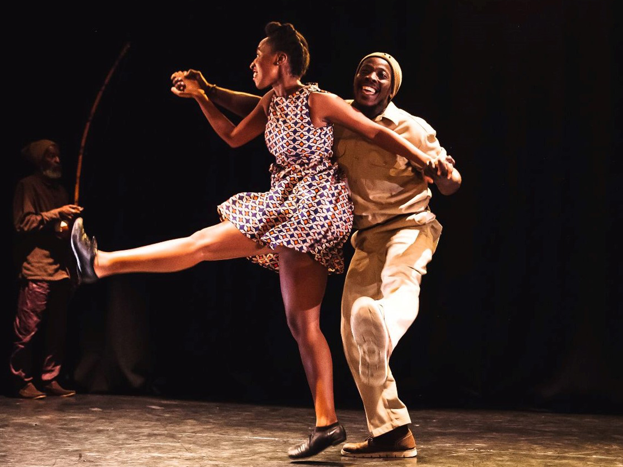 two people dancing holding hands