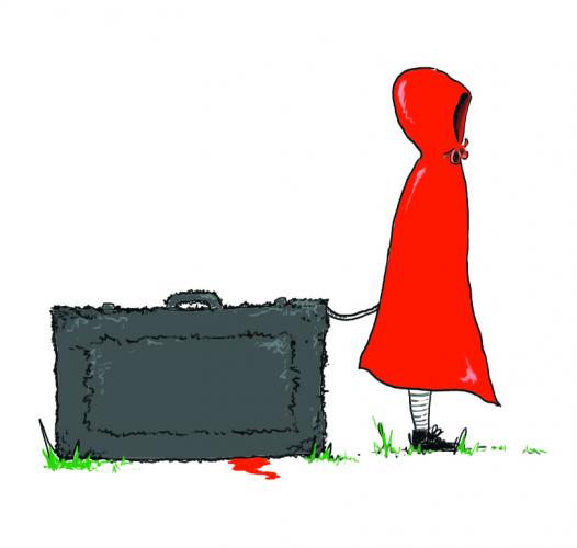 A little girl in a red cloak who is stood with a grey, furry suitcase
