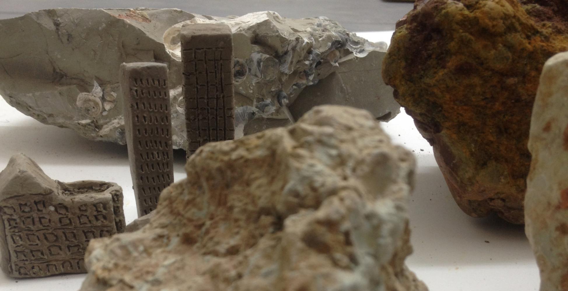 'Construction and Destruction'. Buildings made of London Clay amongst collected samples of earth from under London.