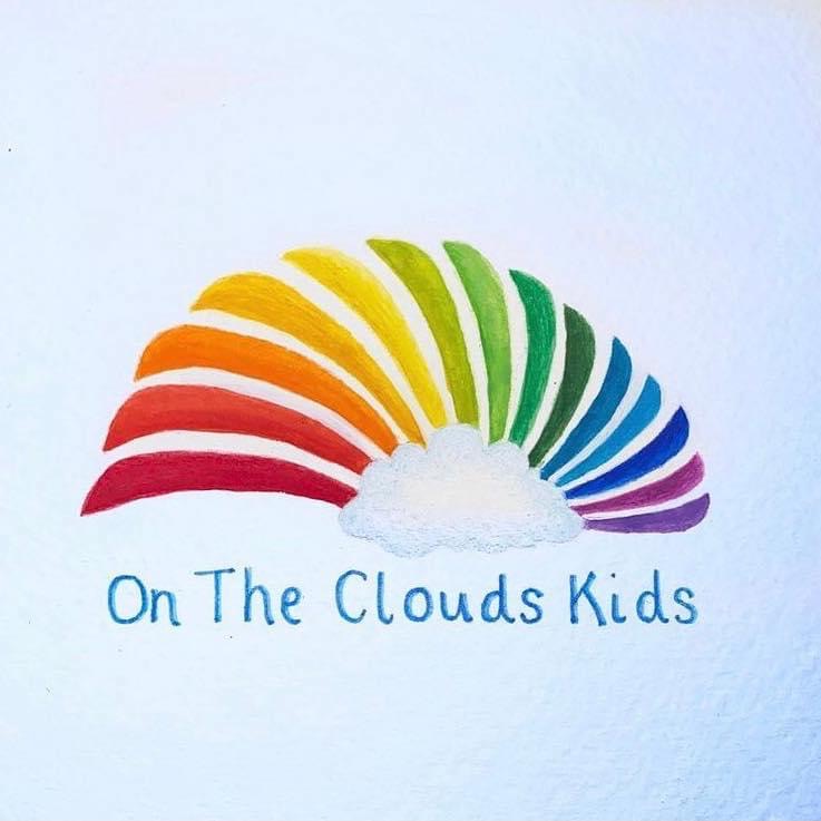 Light blue background with colours of the rainbow going from left to right in a curved shape, coming out a cloud.