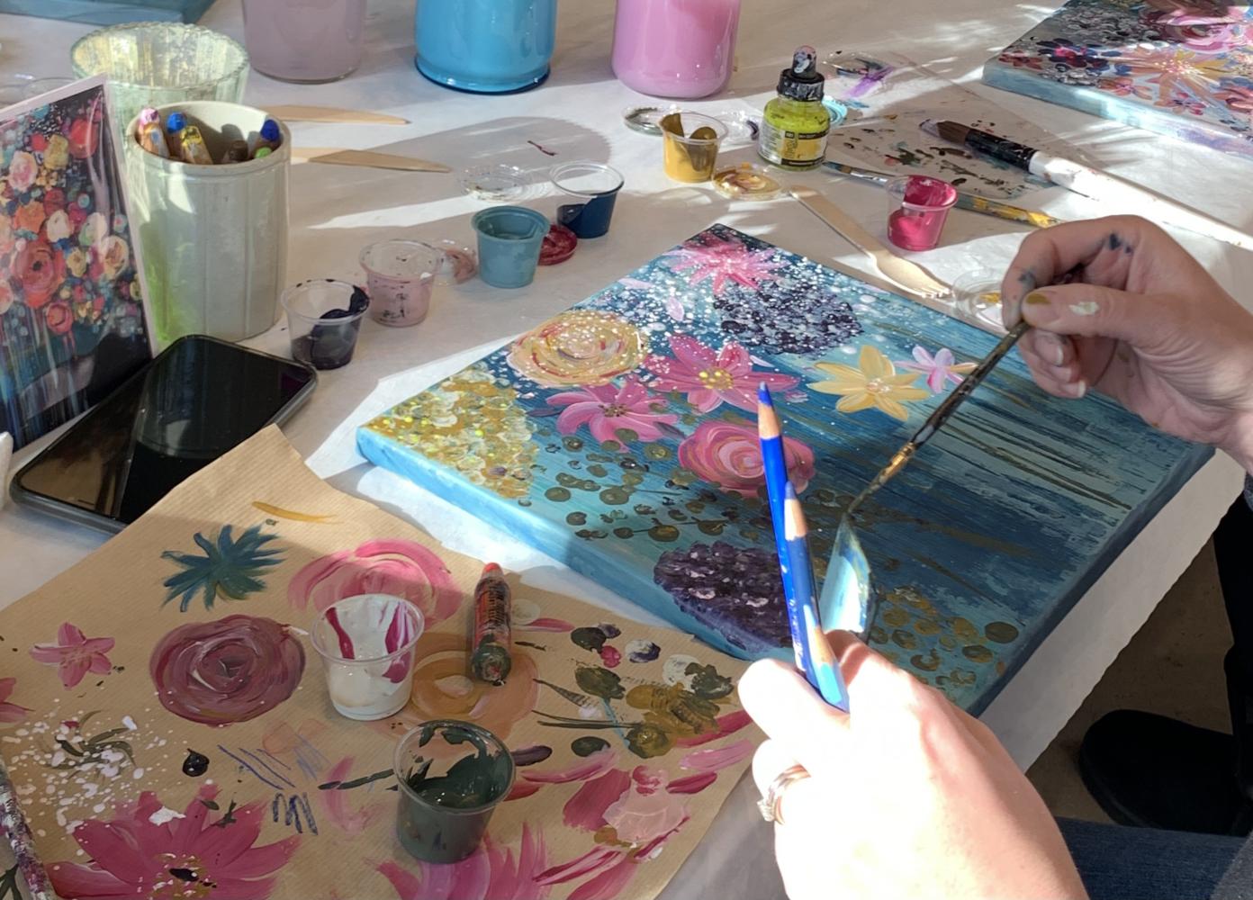 Woman painting a floral